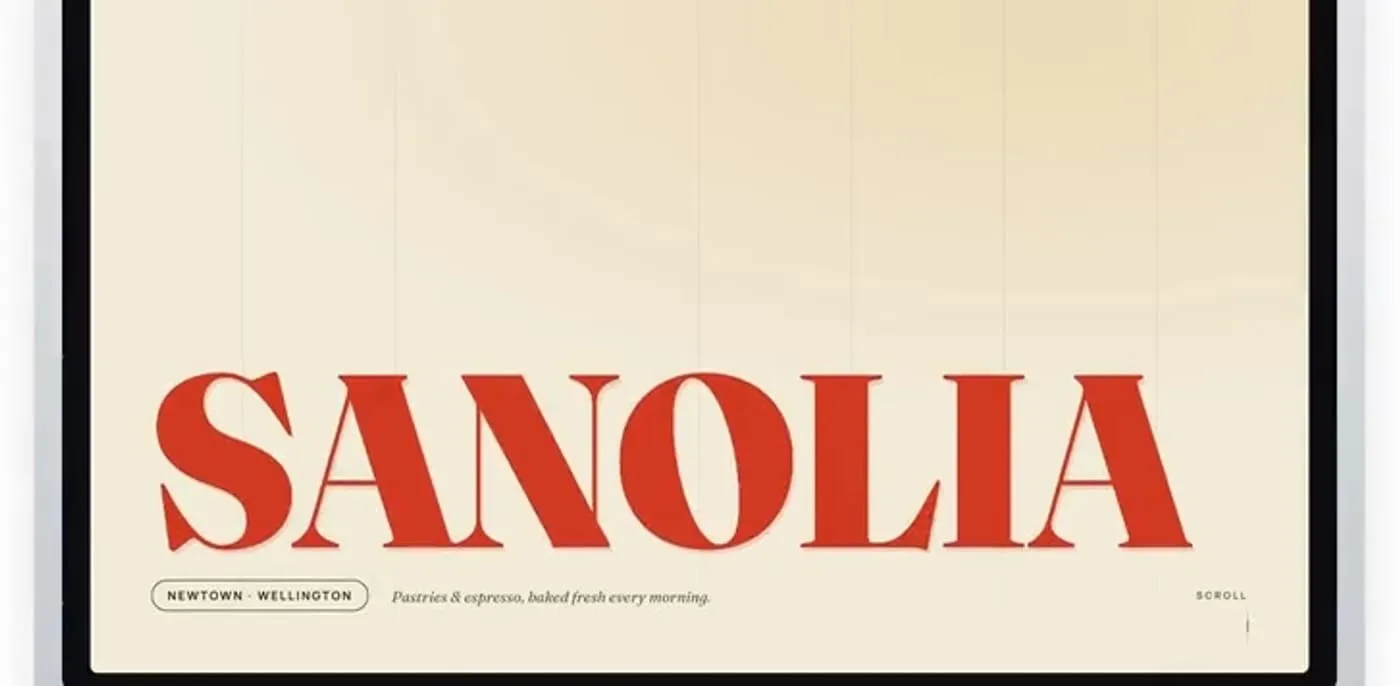 The Sanolia hero: the name in large red display serif on cream